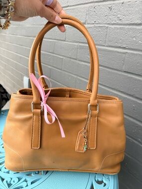 Coach Tan Leather Shoulder Bag with Pink Ribbon Accent